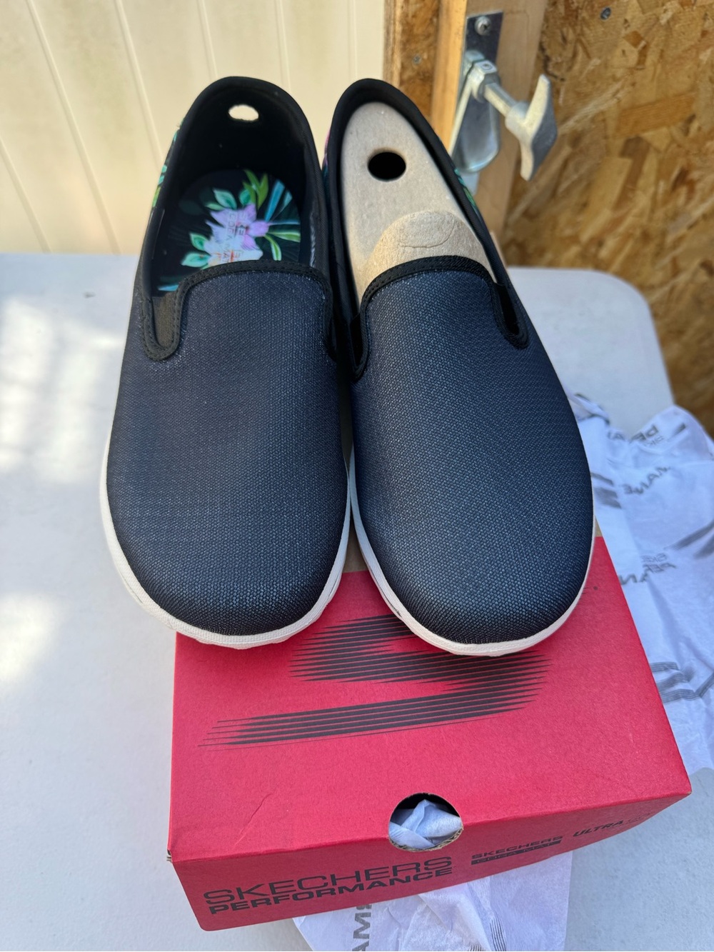 Skechers Black Slip-On Sneakers with Floral Tropical Insole